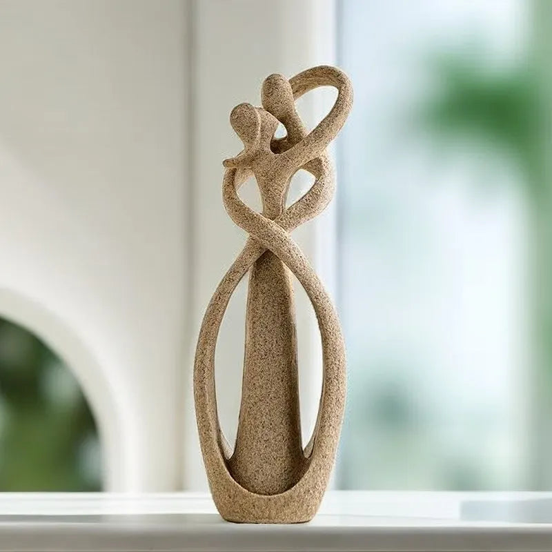 Escultura Abstrata de Casal Beijando em Resina